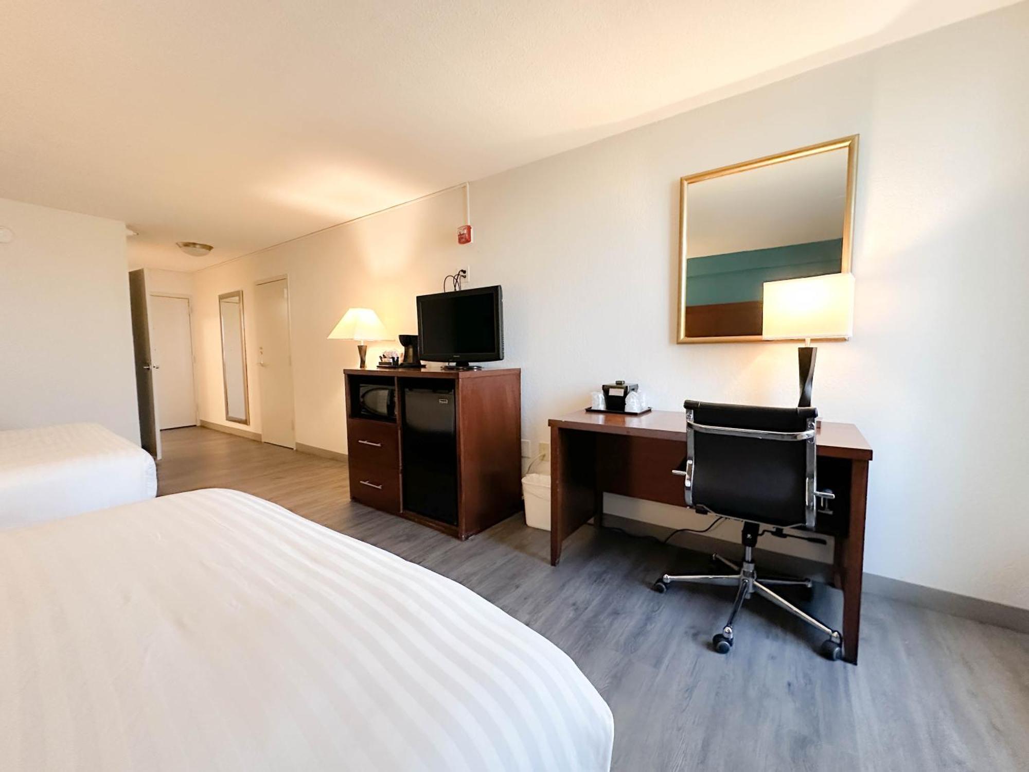 Kamer met 2 Queensize Bedden