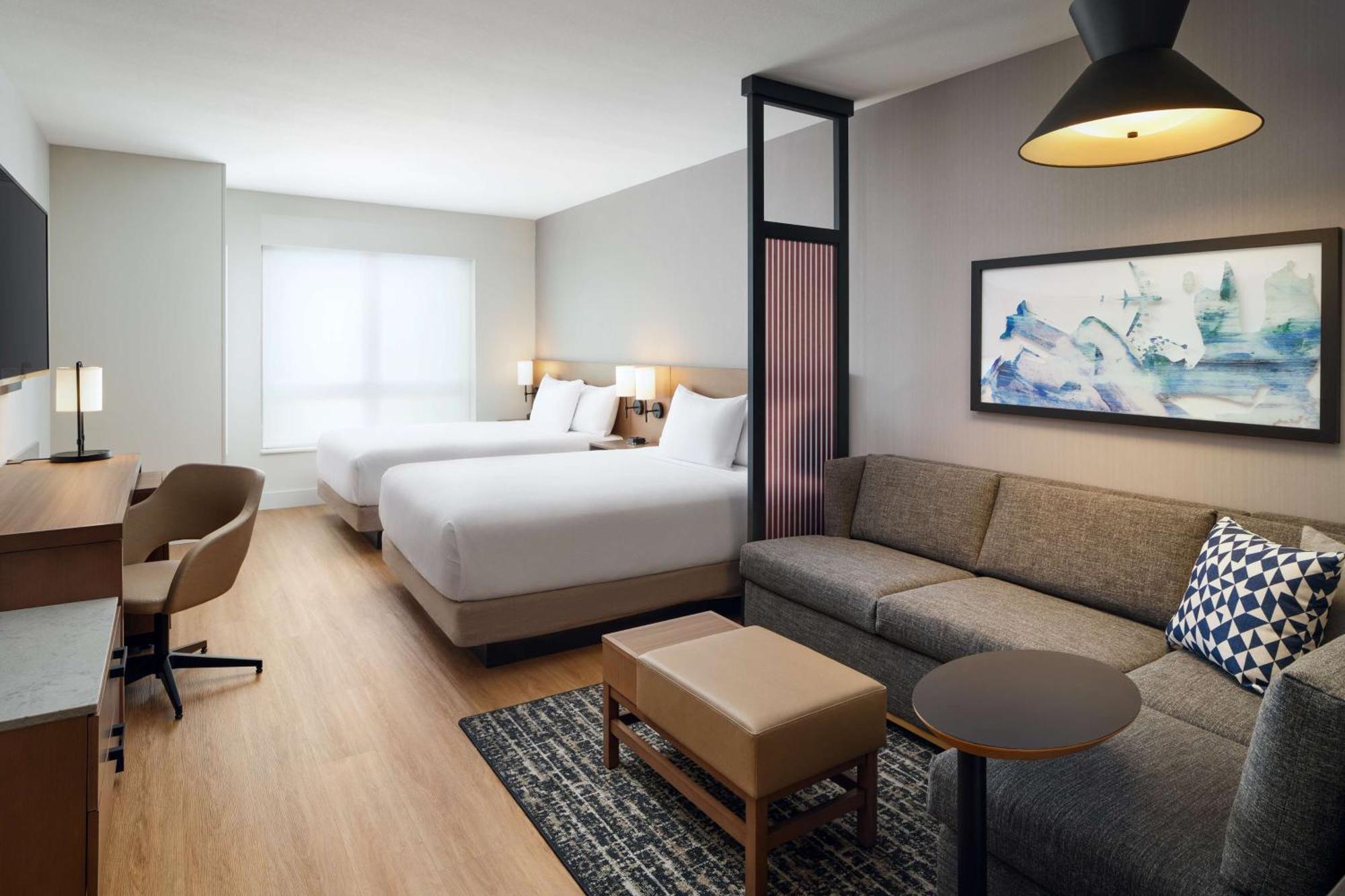 Queen Room with Two Queen Beds with Sofa Bed and Tub - Disability Access