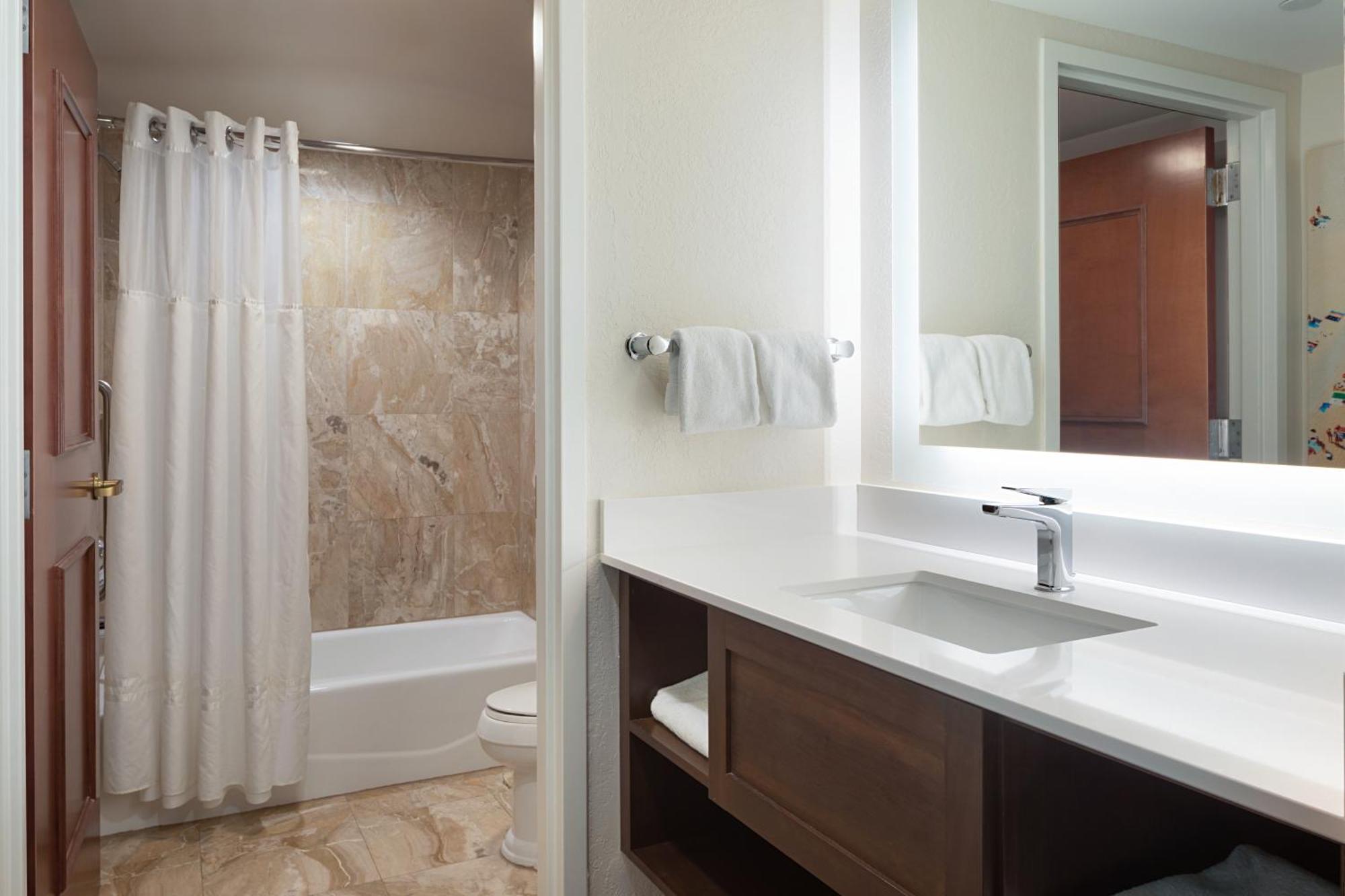 One Bedroom Two Queen Suite - Partial Ocean View