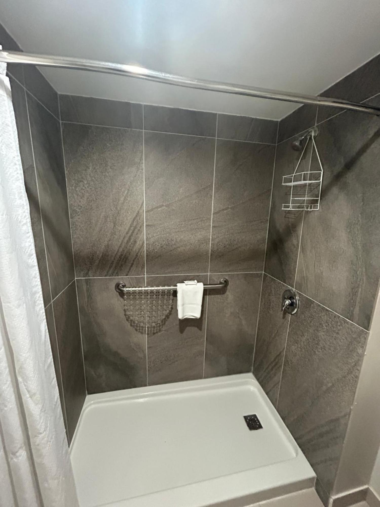One-Bedroom Corner Suite with Two Queen Beds and Living Room - Non-Smoking