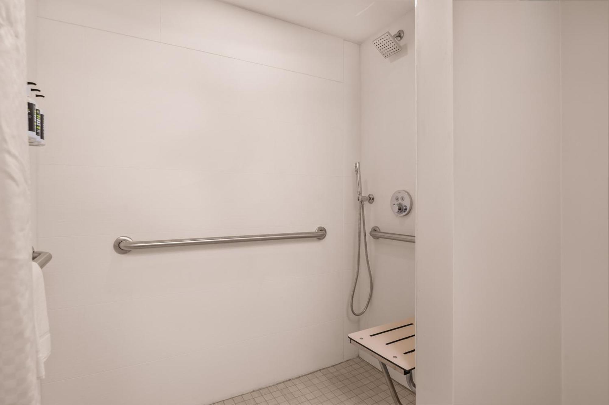 One King Bed Mobility/Hearing Handicap Room Roll-In Shower - Non Smoking